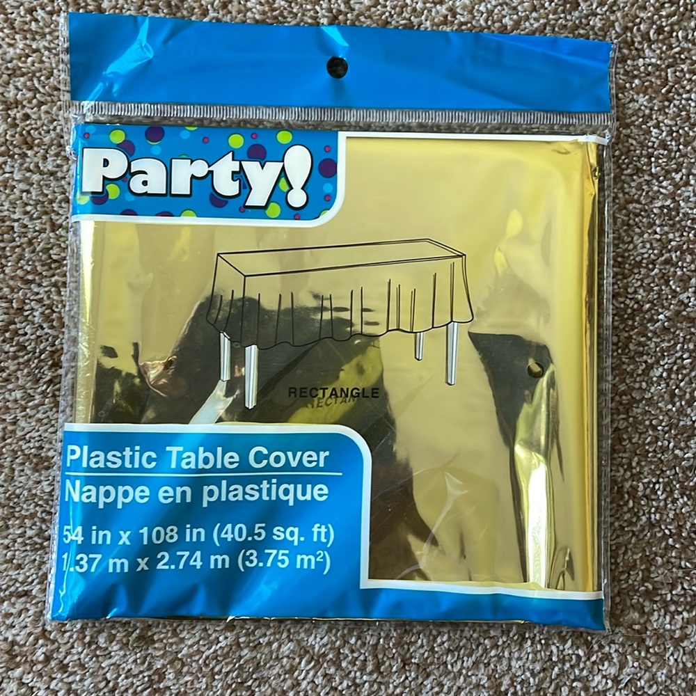 Rectangle gold plastic table cover 54” X 108”